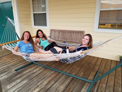 PhD students hanging in the hammocks after a day in the field 